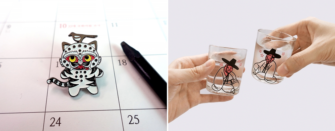 Dua produk MU:DS terpopuler tahun 2025 adalah magpie tiger badge (kiri) dan changing soju glass set (tipsy scholar color).  