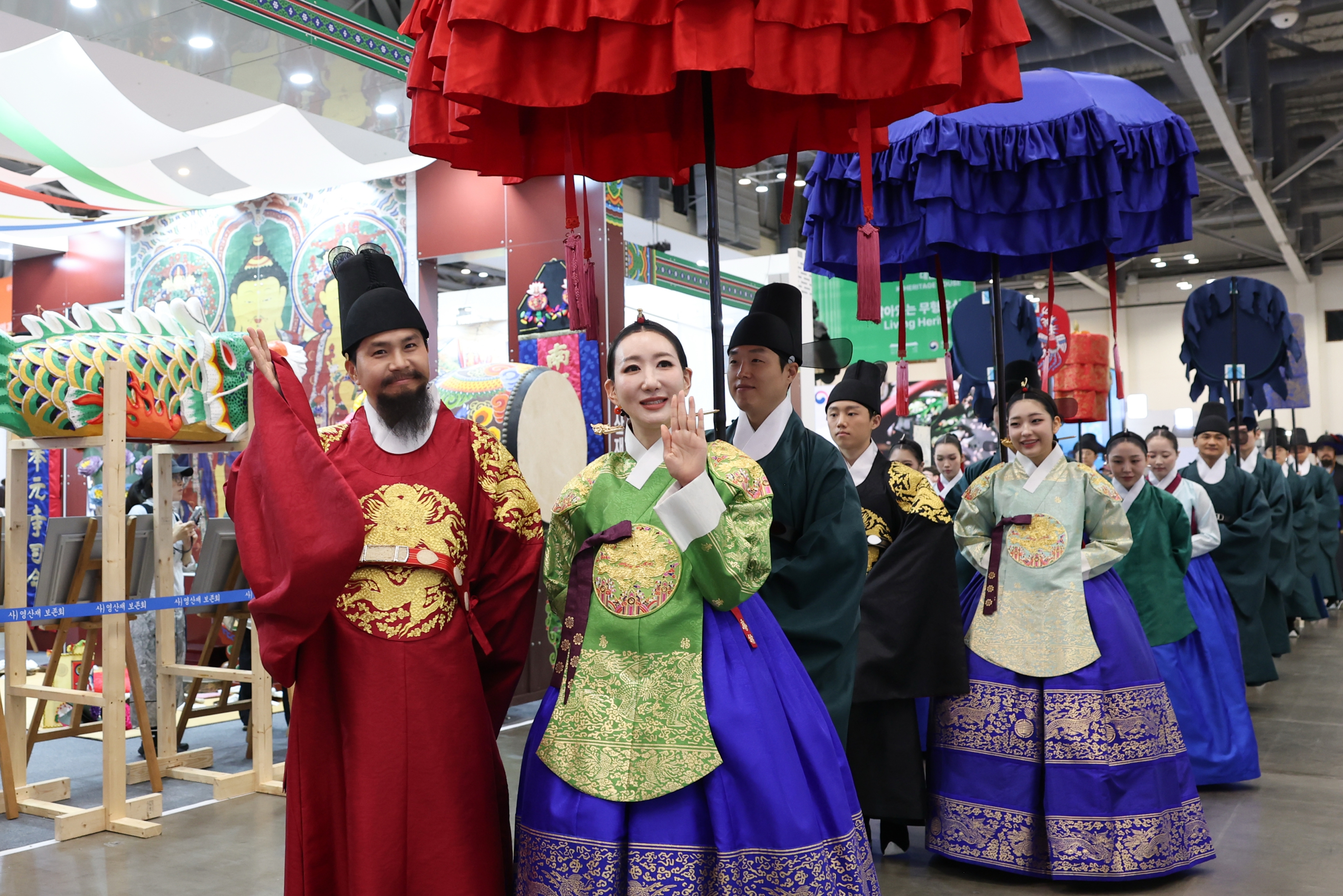 Acara reka ulang Napak Tilas Keluarga Kerajaan digelar pada tanggal 23 Juli 2026 di K-Heritage House yang dibangun di BEXCO, Haeundae-gu, Busan.   style=