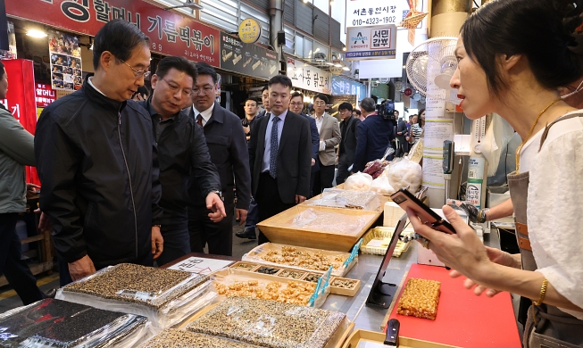Perdana Menteri Han Kunjungi Pasar Tongin
