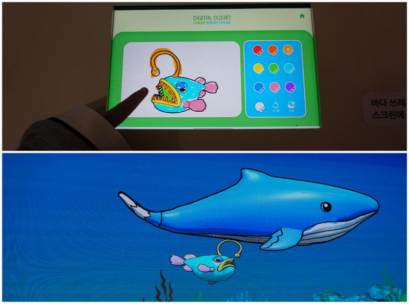 Penulis mencoba mewarnai ikan pemancing (anglerfish). Setelah mengklik tombol selesai, gambar ikan tersebut akan muncul pada layar digital besar. 