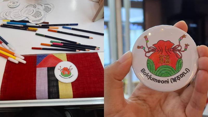 Penulis menghias pin dengan motif bokjumeoni di stan KCCI pada Pekan Kerajinan Jawa Barat 2026 tanggal 28 Juni 2026 di Mal Trans Studio Bandung. 